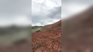 Tractor driver dies after tractor overturns while removing vegetation on highway embankment