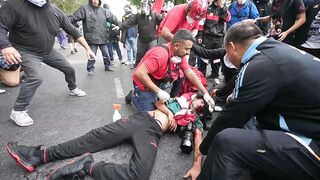 A Photographer takes Direct Hit to the Head while trying to Cover in Buenos Aires