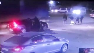 This Woman just Pushed this Guy under a Truck right?