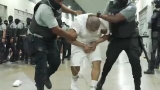 Venezuelan gang members DEPORTED by Trump arrive at the MEGA PRISON in El Salvador.