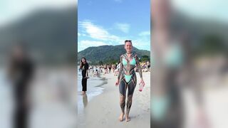 Girl Spent a LOT on Tattoo's to have this Glorious Moment on the Beach