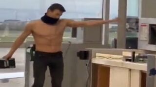 Dude Misses Flight So Naturally He Takes his Shirt off and Destroys the Terminal.