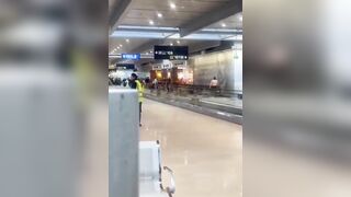 Dude Misses Flight So Naturally He Takes his Shirt off and Destroys the Terminal.