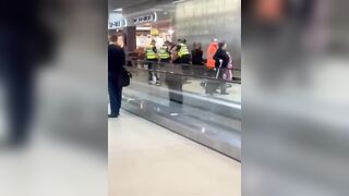 Dude Misses Flight So Naturally He Takes his Shirt off and Destroys the Terminal.