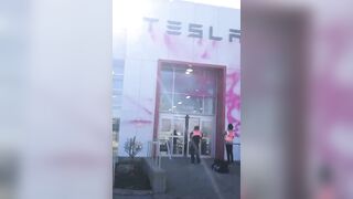 NEW - Climate clowns attack Tesla store in Montreal, Canada.
