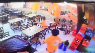 Two female employees are shot in a restaurant after failing to pay extortion