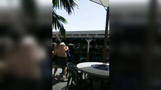 Man slaps woman and immediately gets mobbed