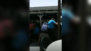 Man slaps woman and immediately gets mobbed