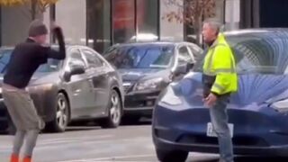 Guy Smashing Tesla's..Second Victim tries to Console?