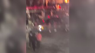 Driver is seen discarding a Stolen Infiniti into a fire pit at a sideshow in Los Angeles, California