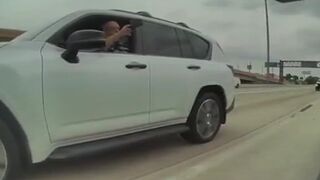 Left Wing Lunatic Tries to Run a Cybertruck off the Road Then Pulls What Appears to Be a Gun in Broad Daylight.