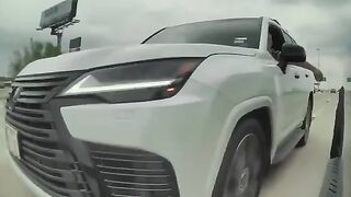 Left Wing Lunatic Tries to Run a Cybertruck off the Road Then Pulls What Appears to Be a Gun in Broad Daylight.