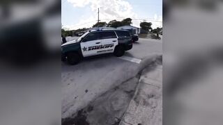 Internet in Uproar of Controversy over this Video of Sheriff Hitting Child with Car then Tackling Him