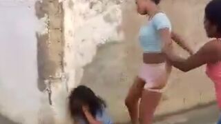 A woman who went viral for beating a high school student in the street was arrested.