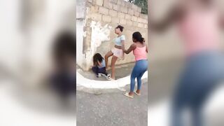 A woman who went viral for beating a high school student in the street was arrested.