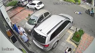 Two Angles and Slow Motion of Woman who Held onto Her Purse