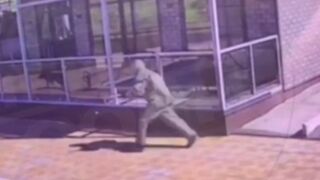 A Hitman in a Chemical Protection Suit Executes High Ranking Officer in Russia