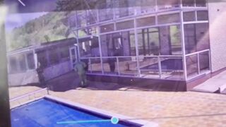A Hitman in a Chemical Protection Suit Executes High Ranking Officer in Russia