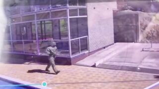 A Hitman in a Chemical Protection Suit Executes High Ranking Officer in Russia