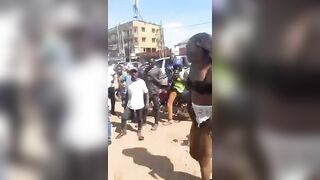 African Girl with Big Butt gets Saved at the Last Second by Buy who Probably Wants to Get Laid