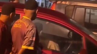 Couple doesn't even know people are watching them..Until a knock at their window..lol