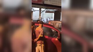 Couple doesn't even know people are watching them..Until a knock at their window..lol
