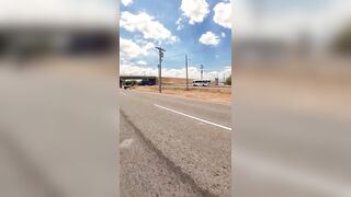 Woman crossing the road hit by a truck caught on a biker's GoPro cam