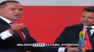Polish Conservative Places an LGBT Flag on his Podium and says “Here, here is your Flag”