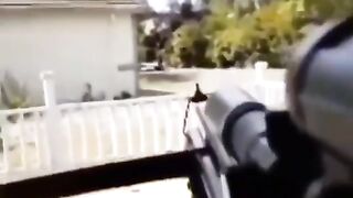 Shocking Video Shows Black Man Threatening White People with a Crossbow.