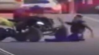 Dude on an ATV Drags a Kansas City Cop Before Doing a Wheelie Over Him