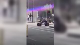 Dude on an ATV Drags a Kansas City Cop Before Doing a Wheelie Over Him