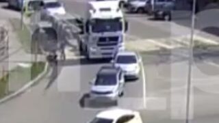 How does the Truck Driver not see this Guy Crossing with his Bicycle?