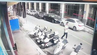 Final Destination in Full power: Single Brick falls from Building and Kills Woman on Bike
