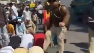 Cop in India Kicks Muslim's Behind while Praying..then Destroying an Illegal Mosque