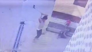 Man smashed by an Ax 5 Times while Sitting with his Child