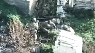 A drone filmed a captured Ukrainian soldier attempting to take weapons from Russian soldiers