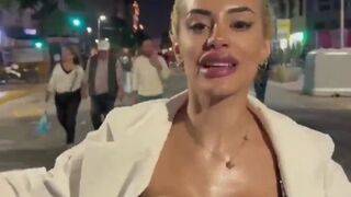 Sweaty Protestor in Argentina, No idea what she's says. But there are two big reasons to agree with her....