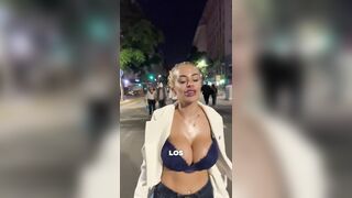 Sweaty Protestor in Argentina, No idea what she's says. But there are two big reasons to agree with her....