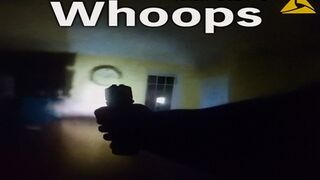 LOL: Female Cop Clearing a House Shoots Her Reflection in a Mirror