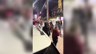 Not-so-smart black guy opens fire at crowd in front of cops, is immediately Shot by the Cops. Tulsa, Oklahoma, USA