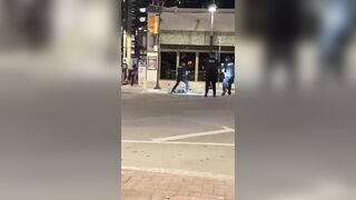 Not-so-smart black guy opens fire at crowd in front of cops, is immediately Shot by the Cops. Tulsa, Oklahoma, USA