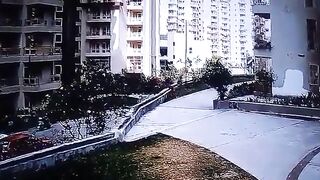 Woman jumps from 2nd Story to Avoid Leached Dog Attack. (Looks to me like She tied up the Dog then Jumped)
