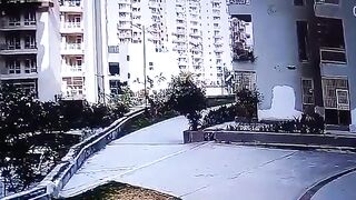 Woman jumps from 2nd Story to Avoid Leached Dog Attack. (Looks to me like She tied up the Dog then Jumped)