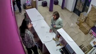 Funny Cat Fight: They throw Cell Phone Accessories at Each Other