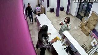 Funny Cat Fight: They throw Cell Phone Accessories at Each Other