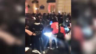 Paris, Beautiful Paris. Car tries to make it through Protestors