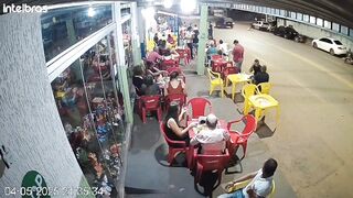 Pretty Girl arriving at the Bar using her Cell phone while Crossing the Street. Watch Road (Slow Motion Added)