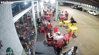 Pretty Girl arriving at the Bar using her Cell phone while Crossing the Street. Watch Road (Slow Motion Added)