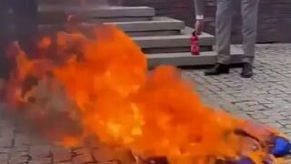 Polish presidential candidate burns EU flag in Protest