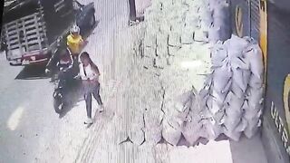 Woman Popped in the Head by Hitmen on Motorcycles